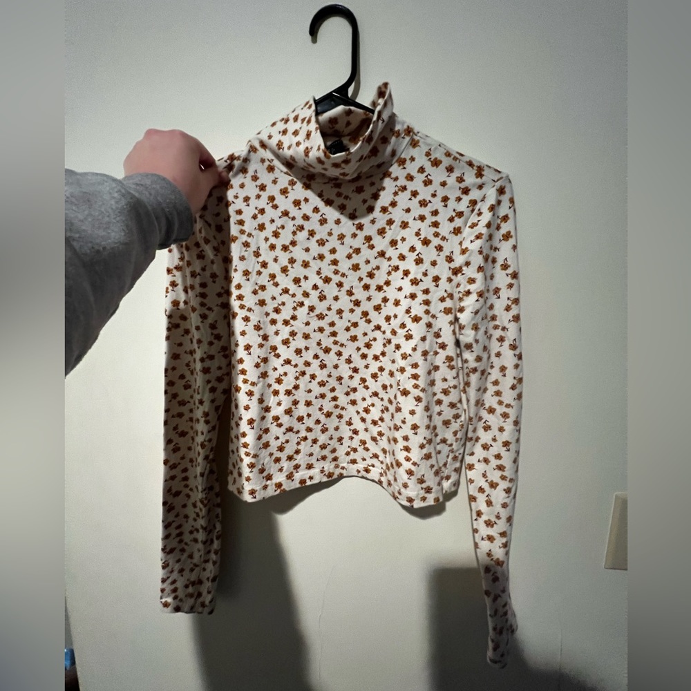 Red and gold floral turtleneck crop top from Forever 21.
